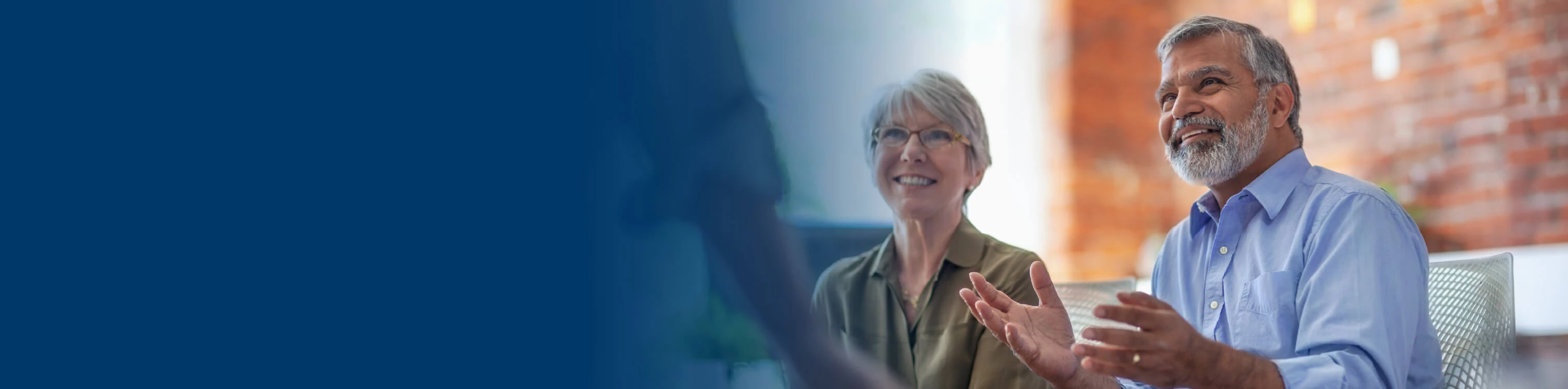 A couple meeting with an advisor