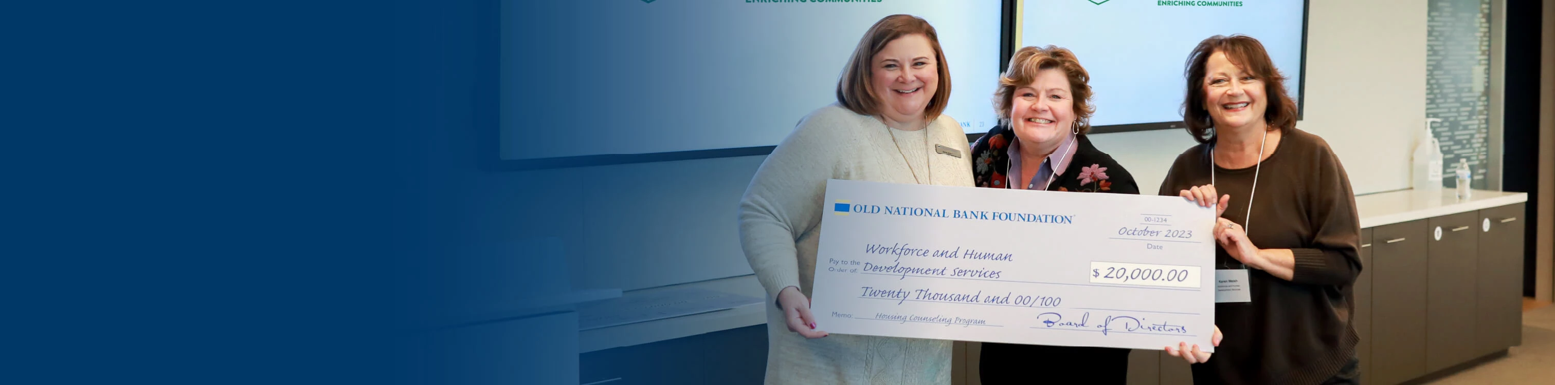 Presentation of a check to Workforce and Human Development Services