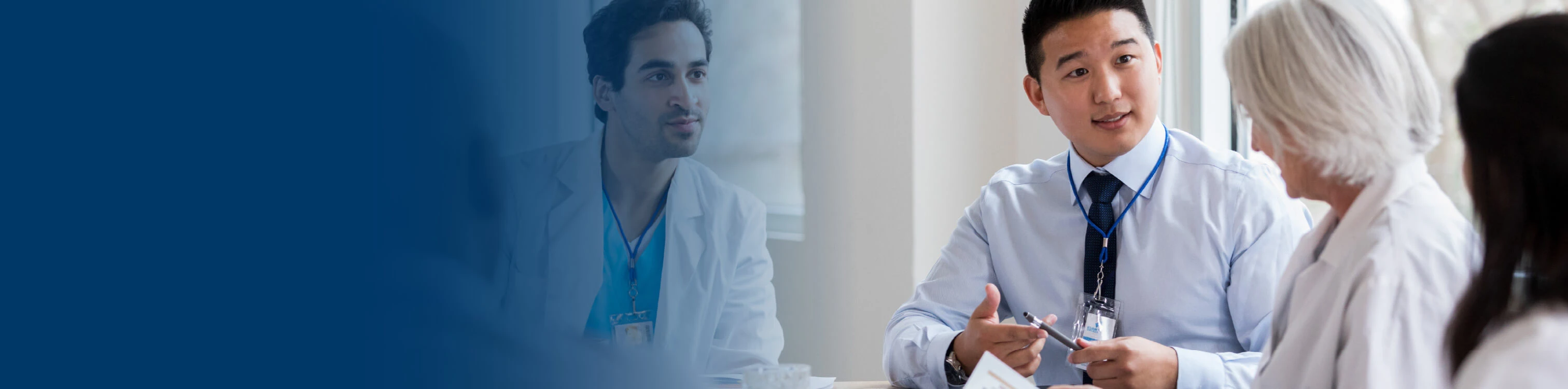 A meeting in a room filled with medical staff