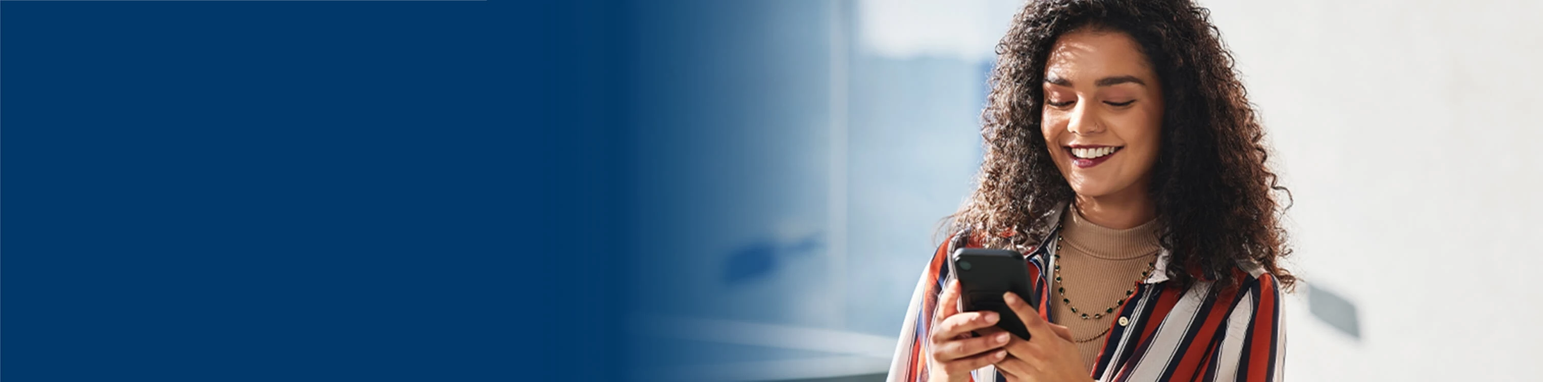 A woman on her mobile device
