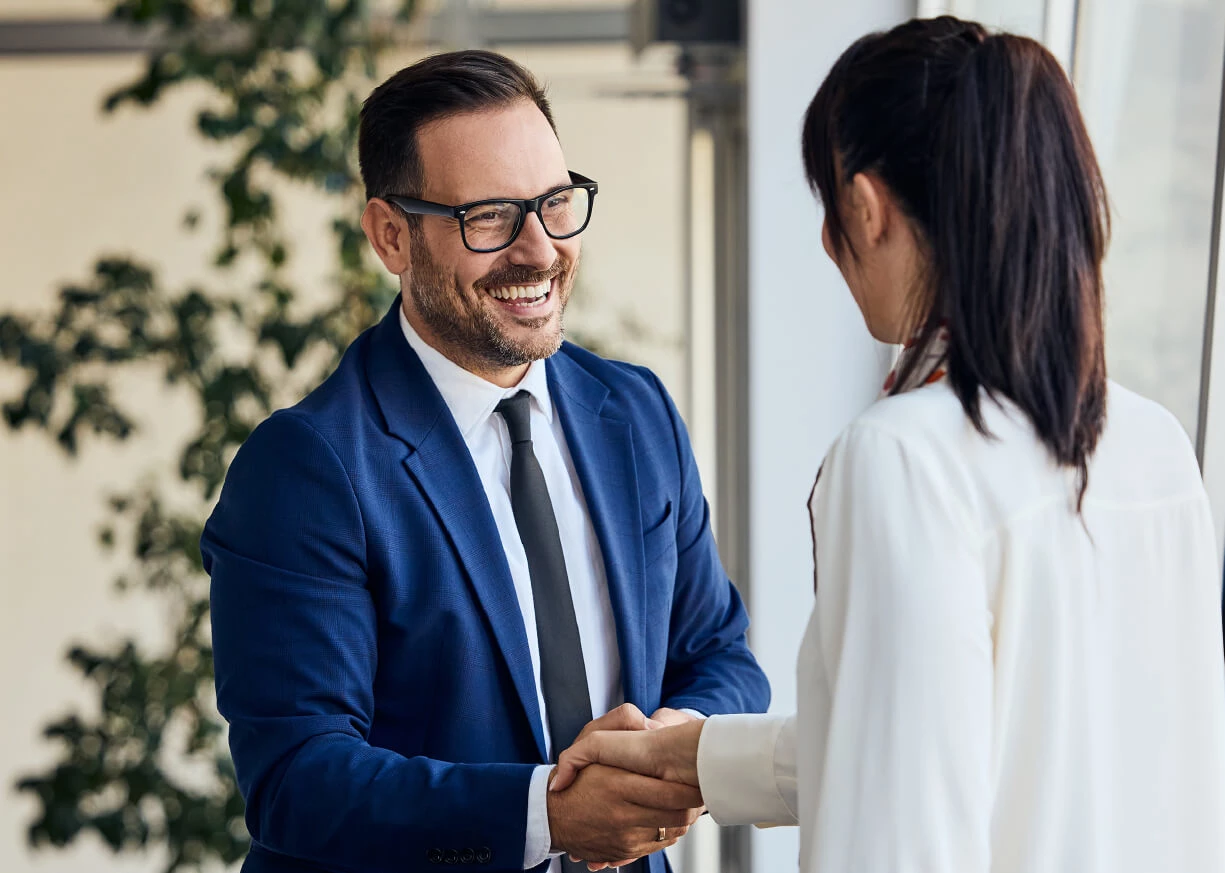 A client shaking hands with a banker